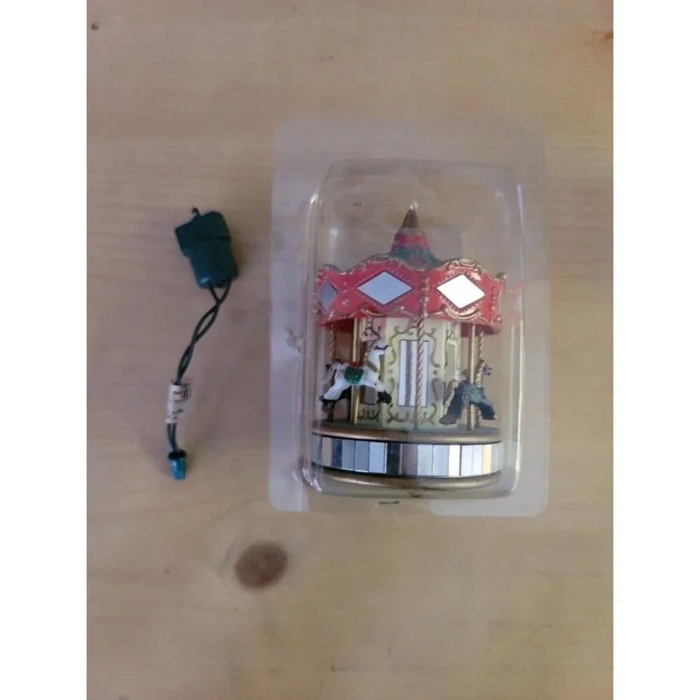 Vintage Noma OrnaMotion Rotating Christmas Ornament‎ Merry-go-round 1989
